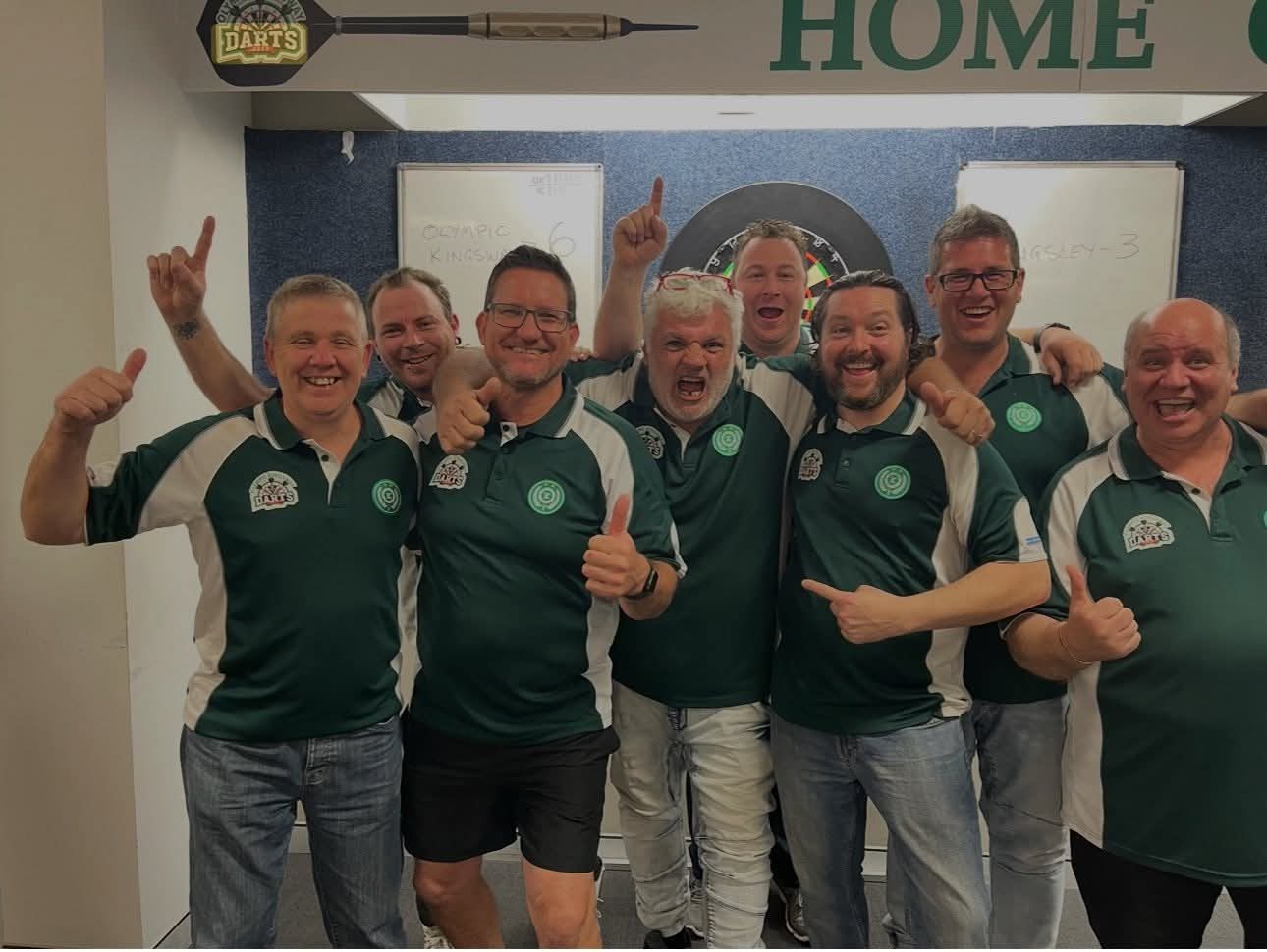 Olympic Kingsway players celebrating in front of the board after a 6–3 win